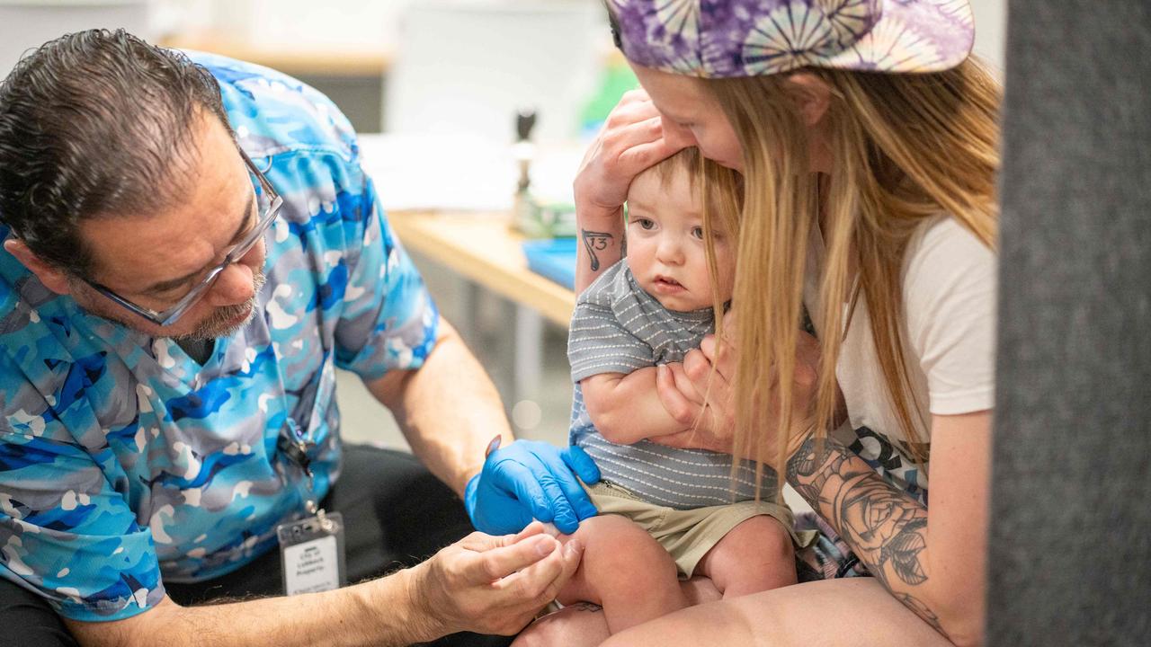 One year-old River Jacobs is held by his mother, Caitlin Fuller, while he receives a measles vaccine in Lubbock, Texas. Picture: Jan Sonnenmair/Getty Images/AFP