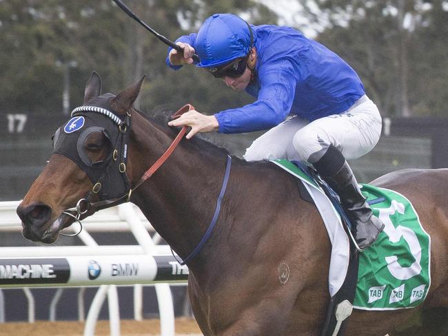 Daily Telegraph - Pictured:  Race 2 - Hugh Bowman riding Sparkle #12 about to win race 2 with Medaille #5 ridden by James McDonald in second place - Warwick Farm race day - 3rd October 2016