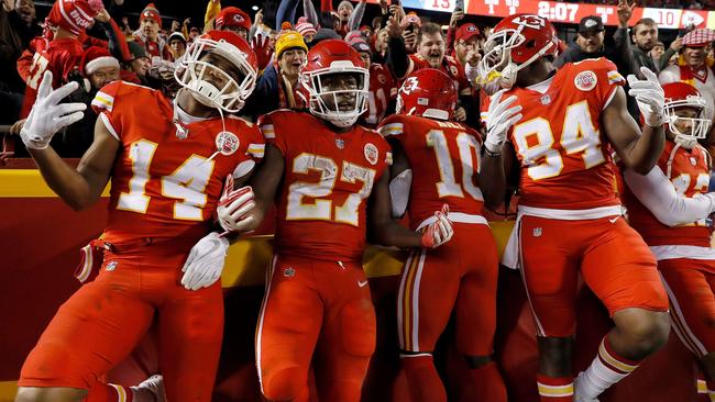 Running back Kareem Hunt of the Kansas City Chiefs celebrates with teammates in the end zone after scoring a touchdown during the game against the Los Angeles Chargers. Photo: Jamie Squire (Getty Images/AFP)