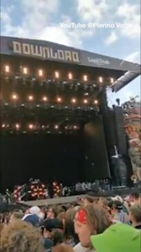 Limp Bizkit frontman Fred Durst helps fan struggling in the crowd