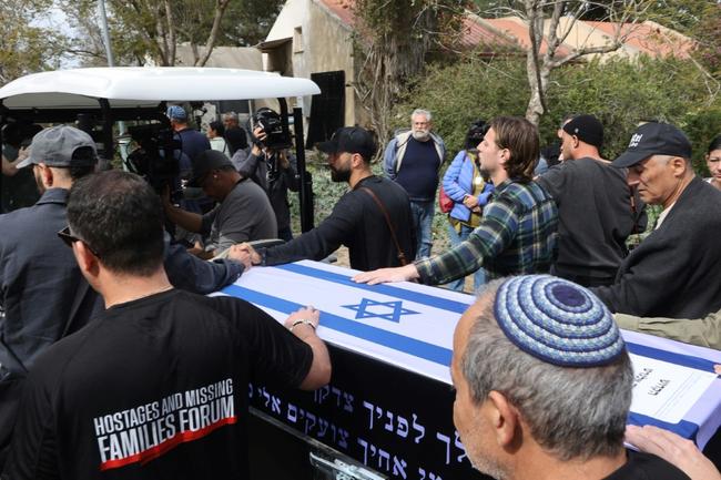 Mourners at the funeral of Danish-Israeli Itzik Elgarat, whose remains have been returned from Gaza