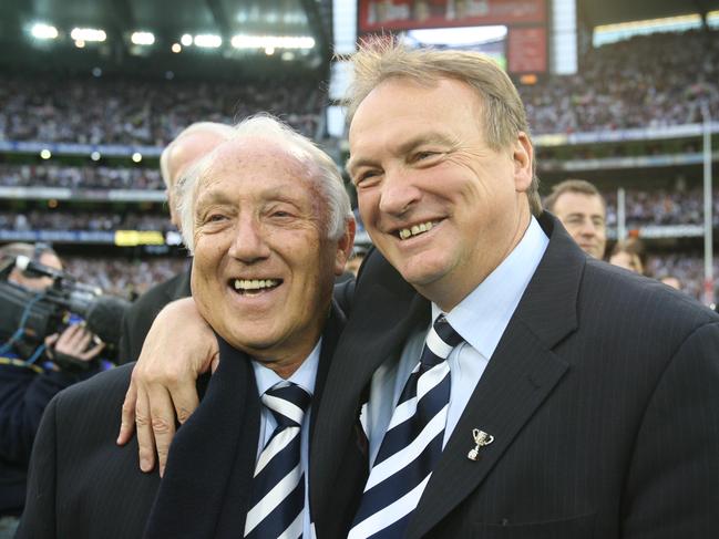 Frank Costa and Brian Cook after the 2007 AFL grand final.