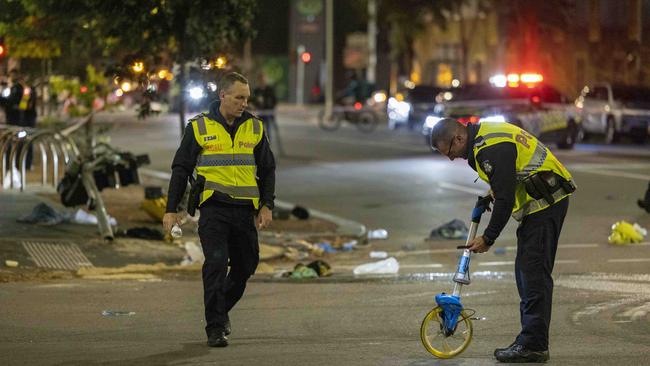 Police survey the scene. Picture: Wayne Taylor