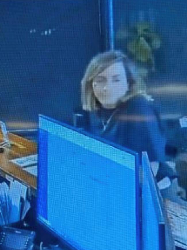 CCTV footage of Samantha Alampi checking into the Diplomat Hotel in Alice Springs.