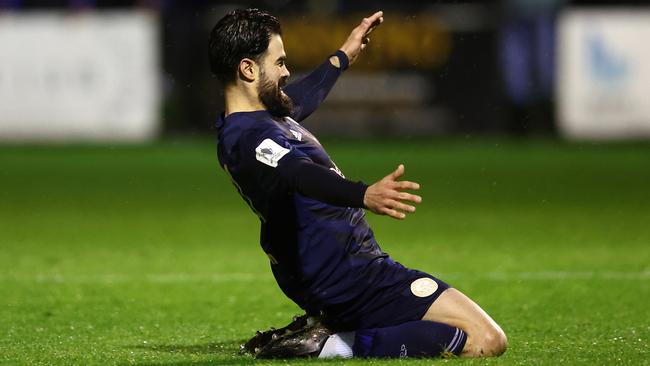 Aryn Williams celebrates a goal for Oakleigh Cannons.