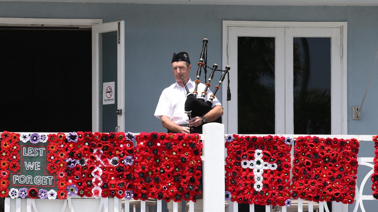 The bagpipes player at the Remembrance Day commemorations at the Cairns Cenotaph PICTURE: ANNA ROGERS