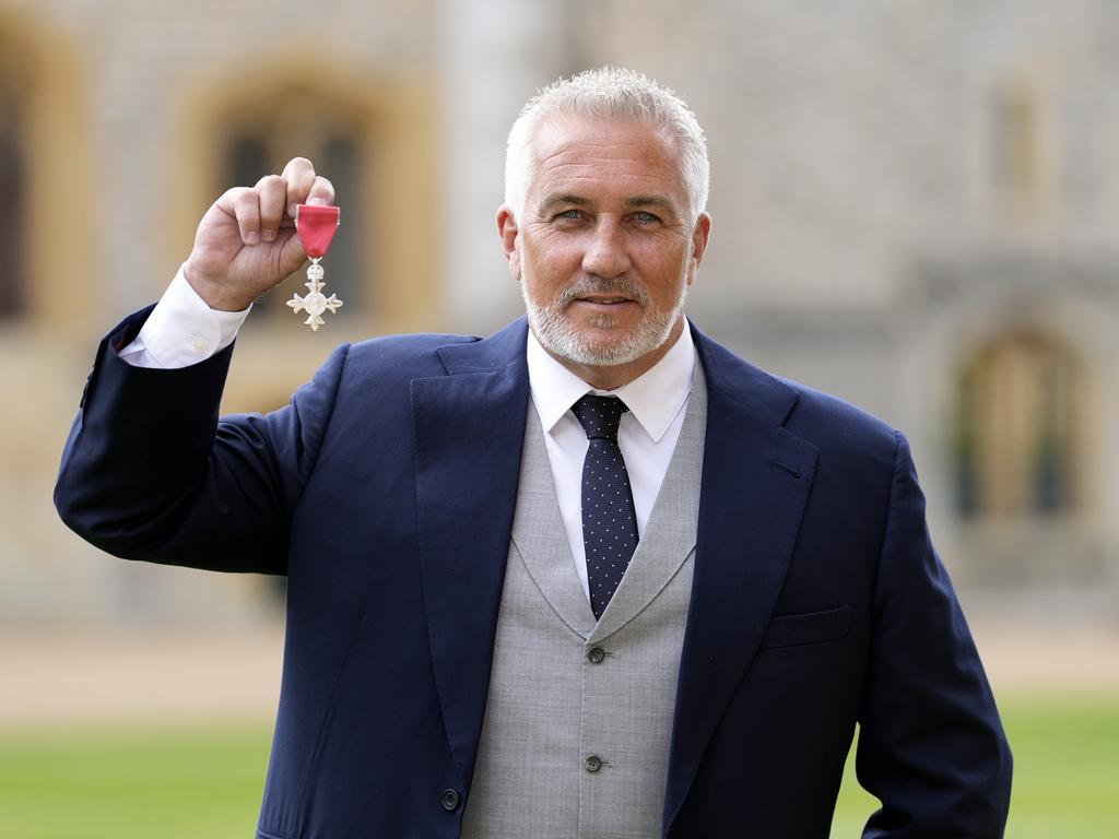 Paul Hollywood, known for his judging role on The Great British Bake Off, holds his medal after being made a Member of the Order of the British Empire. Picture: Andrew Matthews/Getty Images