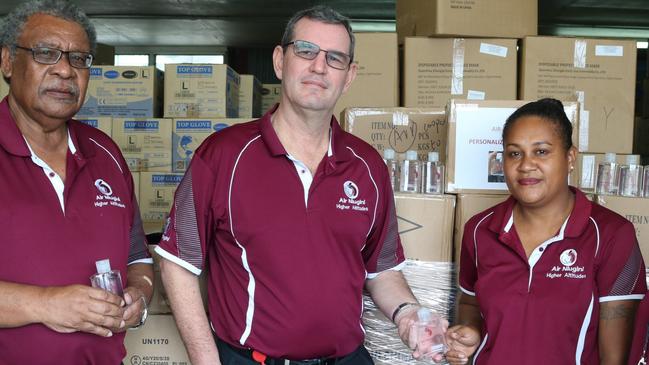 Air Niugini CEO Bruce Alabaster (centre) said the airline’s 45-year tie to Cairns was of “special” significance.