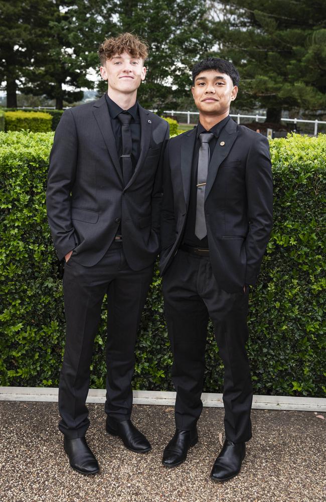 Sam Rametta (left) and Nico Cayanga at Centenary Heights State High School formal at Picnic Point, Friday, November 15, 2024. Picture: Kevin Farmer