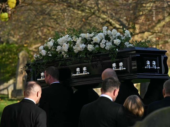 Pallbearers carry the coffin of the late One Direction singer Liam Payne, into the church. Picture: AFP