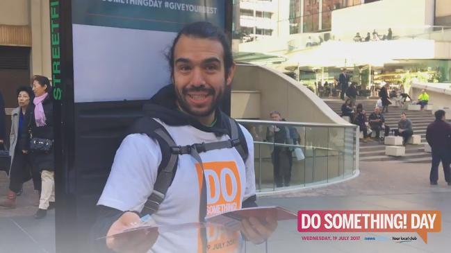 NewsLocal volunteers give out free DoSomething Day chocolates in Martin Place