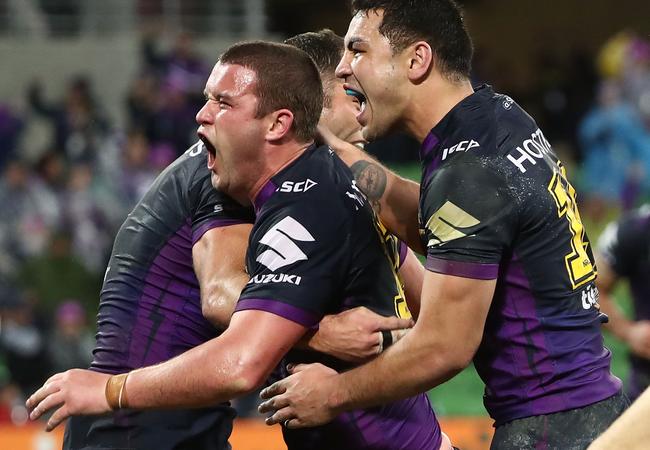 Joe Stimson of the Storm celebrates a try.