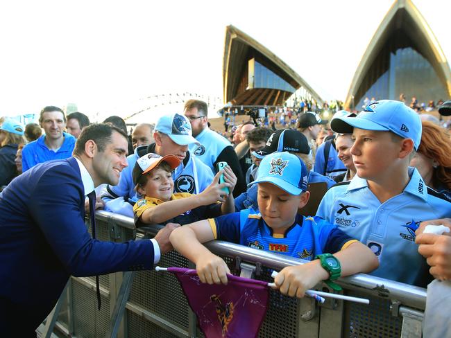 Cameron Smith spots a fan amongst the blue. Picture: Mark Evans
