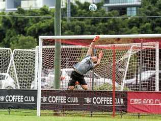 GOOD SAVE: South West Queensland Thunder keeper Jacob Sayle touches the ball over the crossbar in his side's loss to Olympic. The Thunder men play their first home of the season against North Queensland today at Clive Berghofer Stadium from 5pm. Picture: DSL Photography