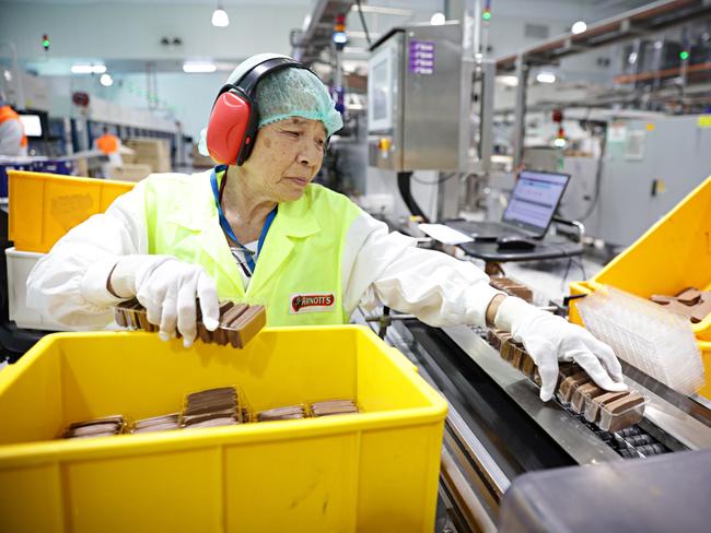 'Nana' Luuhas just celebrated her 40 year anniversary at Arnott’s. Picture: Adam Yip