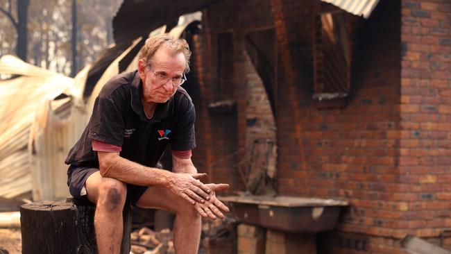 Daily Telegraph. Houses lost in the Nana Glen bushfrie. Mechanic Warren Smith at his destroyed home on Ellems Quarry Rd, Nana Glen. Picture Nathan Edwards.