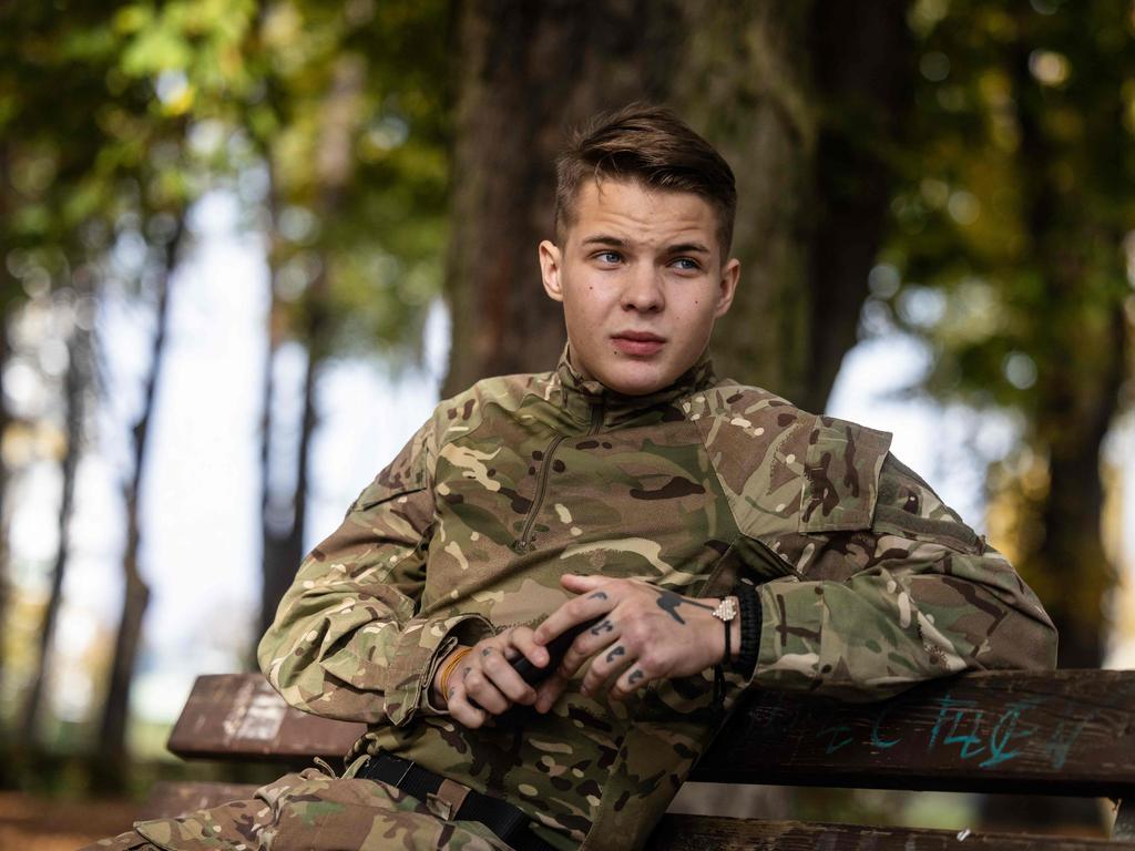 Belarussian volunteer Gleb Gunko is pictured during an AFP interview on October 18, 2022 in Grojec park in Warsaw.