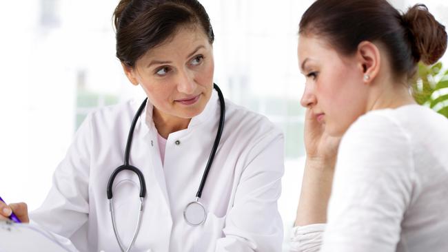 doctor with female patient