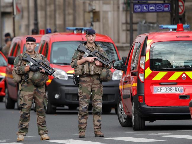 French soldiers stand guard near Paris prefecture de police (police headquarters) after the attack. Picture: AFP