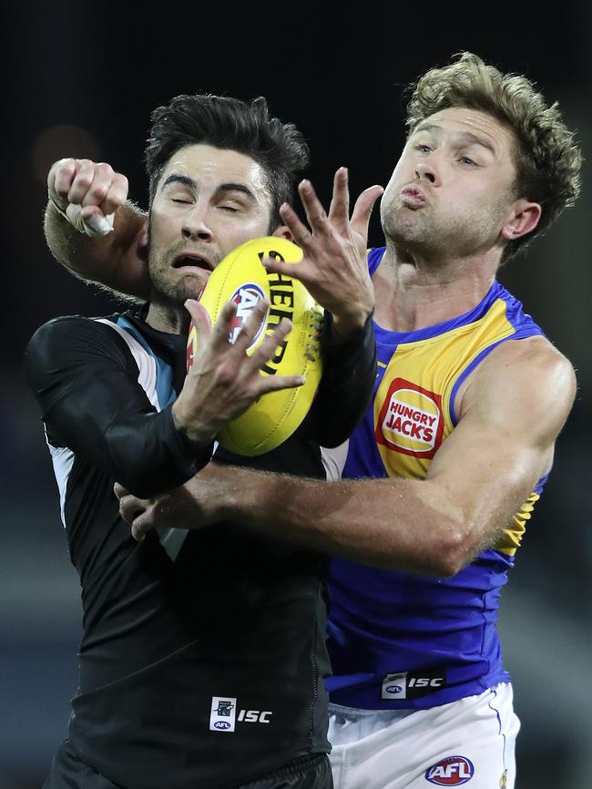 Chad Wingard under pressure on Saturday night, the same position Port Adelaide now sits with two rounds remaining. Picture SARAH REED