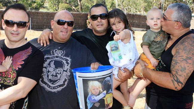 Tom Karas, John Khoury, Matty Thomas and child and Mick Gatto and his grandson raising funds for bushfire victims in 2009.