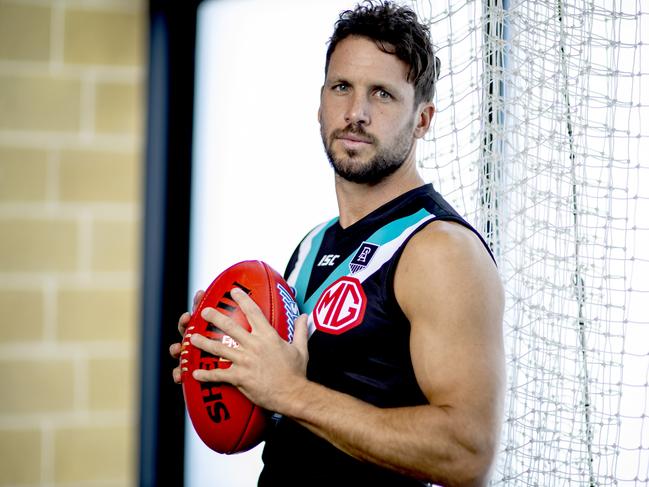 AFL Port Adelaide Player Travis Boak poses for a portrait at the Port Adelaide Football Club in Adelaide, Wednesday, February 26, 2020. (AAP Image/Kelly Barnes) NO ARCHIVING