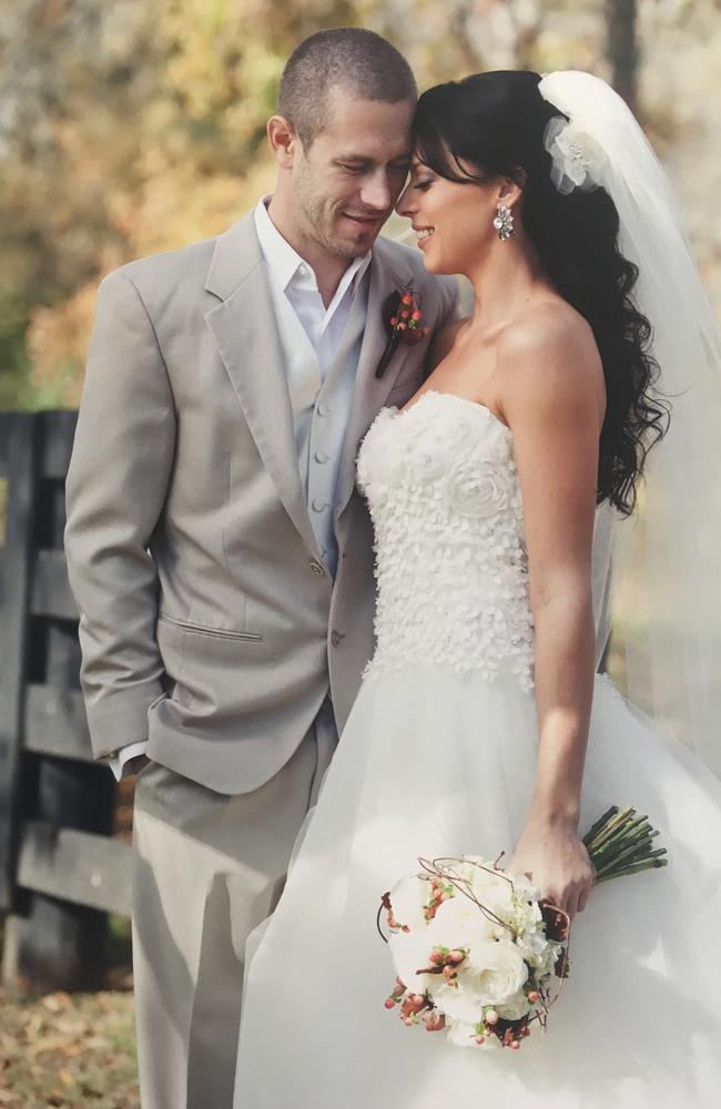 Suz Cox and husband Phil on their wedding day in October 2011.