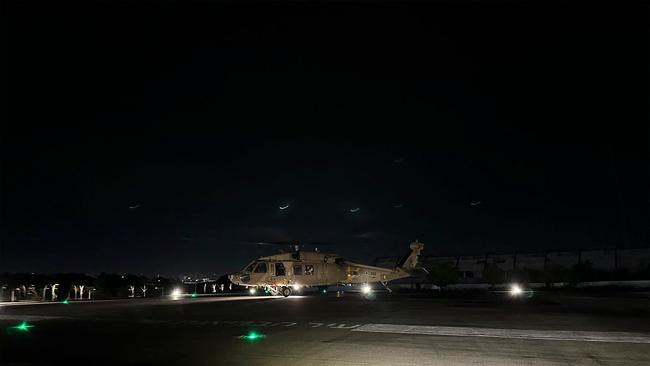 This photo provided by the Israeli military shows an Israeli Air Force helicopter said to be carrying the freed men in Ramat Gan, Israel. Picture: Israeli Army/AFP