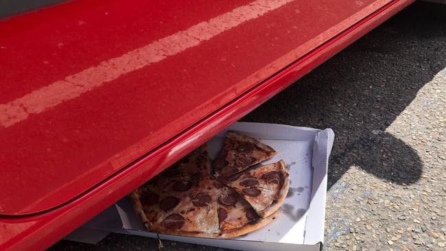 The owner of the Little Italy pizzeria said this was the, pizza that Dylan Walker bought last night that ended up on the ground in the car park after the alleged confrontation. Picture: Jim O’Rourke