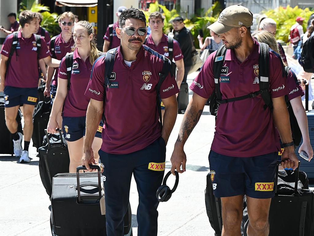 Brisbane Lions players at the airport before a game last season.