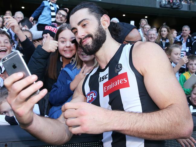 MELBOURNE, AUSTRALIA - MAY 18: Brodie Grundy of the Magpies celebrates the win with fans during the round nine AFL match between the Collingwood Magpies and the St Kilda Saints at Melbourne Cricket Ground on May 18, 2019 in Melbourne, Australia. (Photo by Michael Dodge/Getty Images)