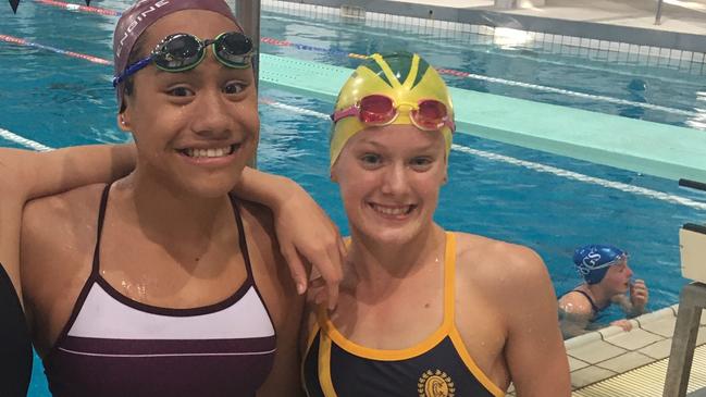 Tiana Kritzinger, right, proudly wearing the Clayfield College swimmers after a podium finish at the QGSSSA meet earlier this year.