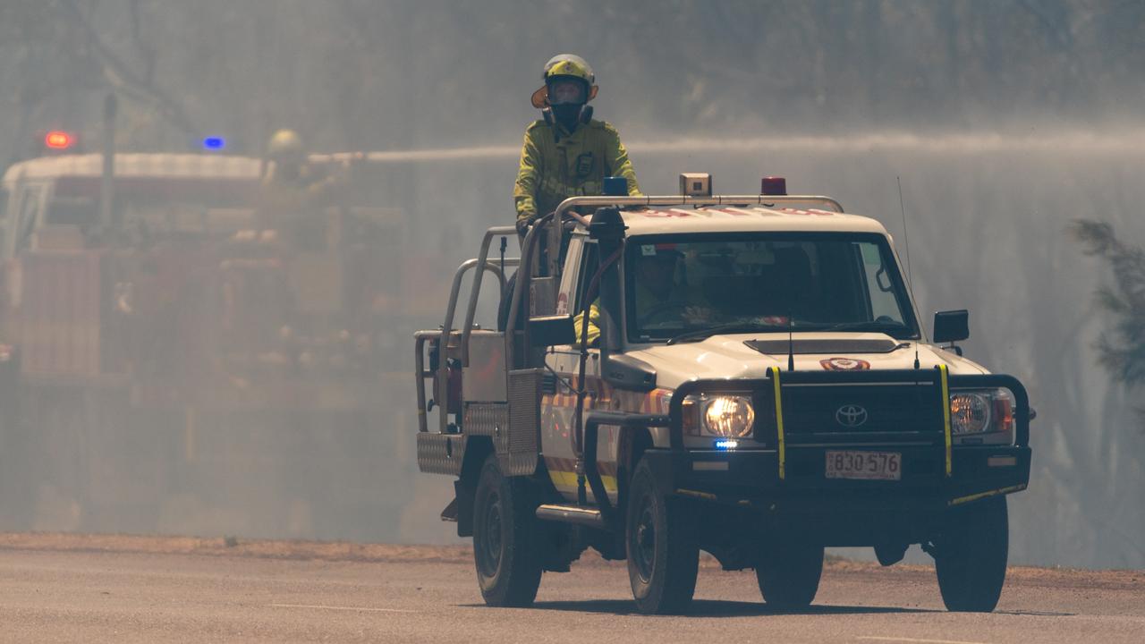 Another day of extreme fire conditions saw numerous fires break out across Darwin’s rural regions in late August.. A bushfire at Gunn Point Road was quickly brought under control by numerous crews working in windy conditions. Picture: Che Chorley