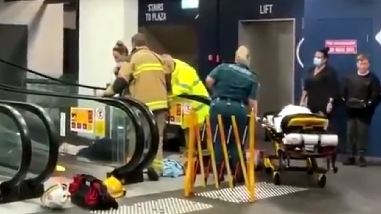 The woman slipped while travelling on the escalator and became trapped. Picture: 9 News