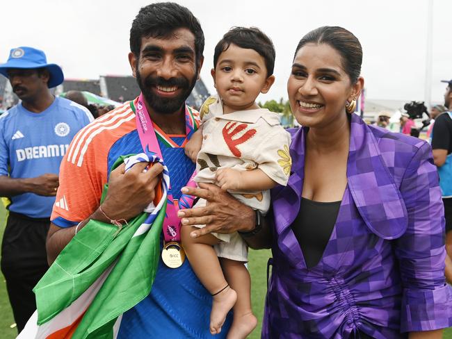 Jasprit Bumrah and his wife Sanjana Ganesan and son Angad.