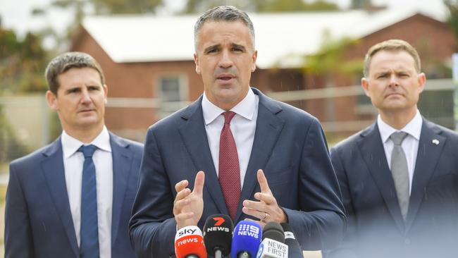 Master Builders SA chief executive Will Frogley, Premier Peter Malinauskas and Treasurer Stephen Mullighan make the announcement at Seaton on Tuesday. Picture: NewsWire/Roy VanDerVegt