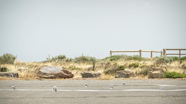 Police markers show the scene of the shooting at Gull Rock car park near Maslin Beach. Picture: Mike Burton/AAP