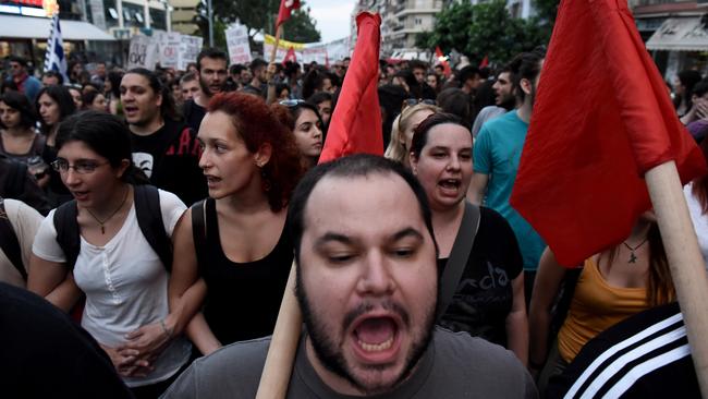Demonstrators shout slogans during a rally by supporters of the 'No' vote to the upcoming referendum in the northern Greek port city of Thessaloniki, Wednesday, July 1, 2015. Eurozone finance ministers decided Wednesday to break off talks on more aid for Greece until after it holds a weekend referendum, even as the Greek government pressed ahead with plans to let the people decide whether to accept more austerity measures in exchange for a rescue deal. (AP Photo/Giannis Papanikos)