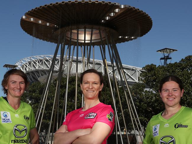 SYDNEY, AUSTRALIA - SEPTEMBER 22: Sammy-Jo Johnson and Hannah Darlington of the Thunder and Sarah Aley of the Sixers pose during a Women's Big Bash League shoot at Sydney Olympic Park Athletic Centre on September 22, 2020 in Sydney, Australia. (Photo by Mark Metcalfe/Getty Images)