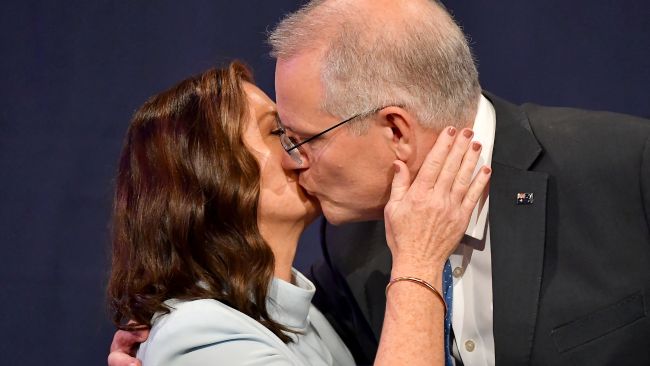 Scott Morrison kisses his wife Jenny as he concedes defeat. (Photo: SAEED KHAN / AFP)