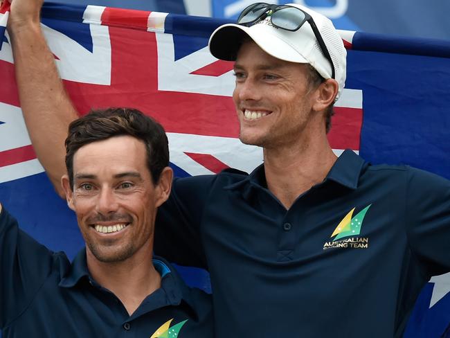 FUJISAWA, JAPAN - AUGUST 22: Gold medalists Mathew Belcher and Will Ryan of Australia celebrate during the medal presentation of the Men's 470 class on day 6 of the Sailing Tokyo 2020 test event at Enoshima Yacht Harbour on August 22, 2019 in Fujisawa, Kanagawa, Japan. (Photo by Matt Roberts/Getty Images)