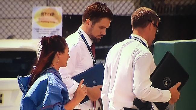 Paania Lawrence, also known as Paanice Lawrence, with detectives the day of her partner Scott Morrison was shot.
