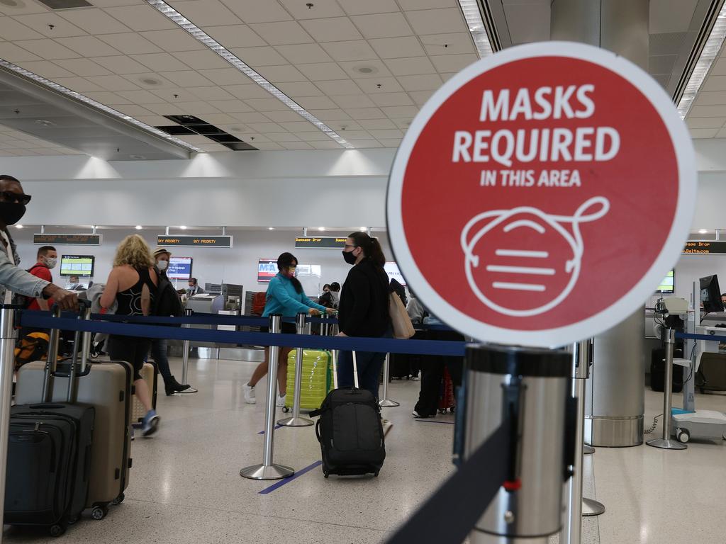 Masks are mandatory in airports and on planes. Picture: Joe Raedle/Getty Images/AFP