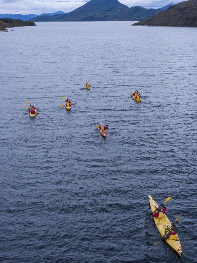 Kayakers on Lake Pedder. Picture: Rob Blakers.