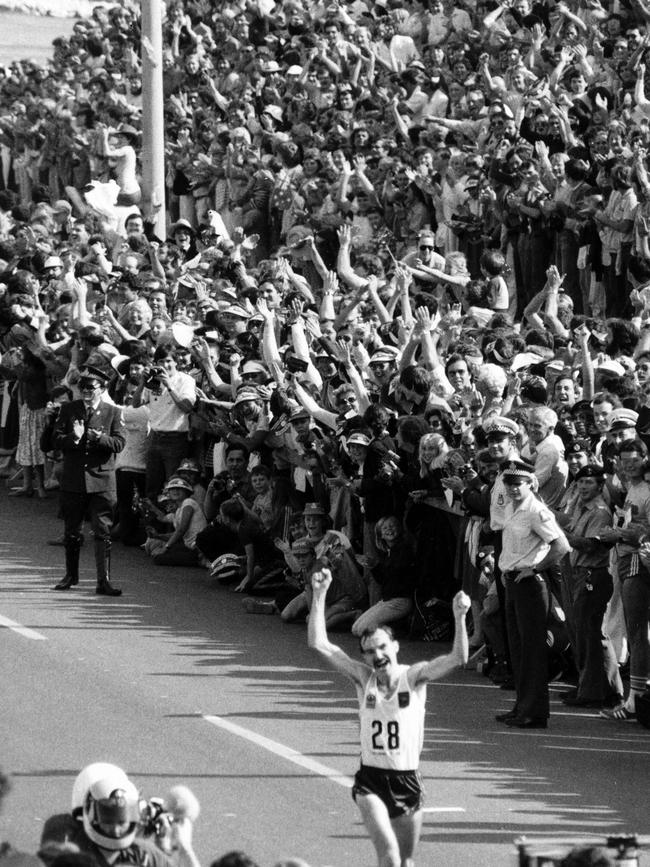 Robert de Castella crossing the finish line at the 1982 Commonwealth Games in Brisbane.