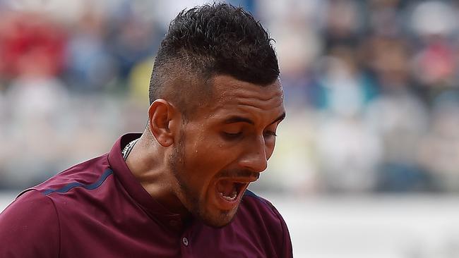 Nick Kyrgios reacts during his match against Rafael Nadal.