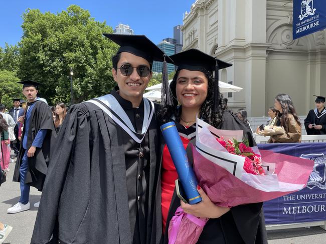 Pranjal Tiwary and Yashvi Narula graduate with a Bachelor of Commerce at the 2024 University of Melbourne graduations. Picture: Himangi Singh