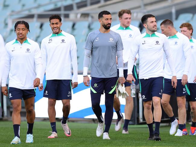 Paul Izzo (centre) is one of the goalkeepers hoping to play for the Socceroos against Japan on Tuesday night. Picture: Sarah Reed/Getty Images