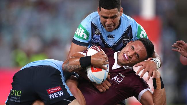 NSW and Queensland at war. Valentine Holmes of the Maroons is tackled during game two of the 2020 State of Origin series. Picture: Mark Kolbe