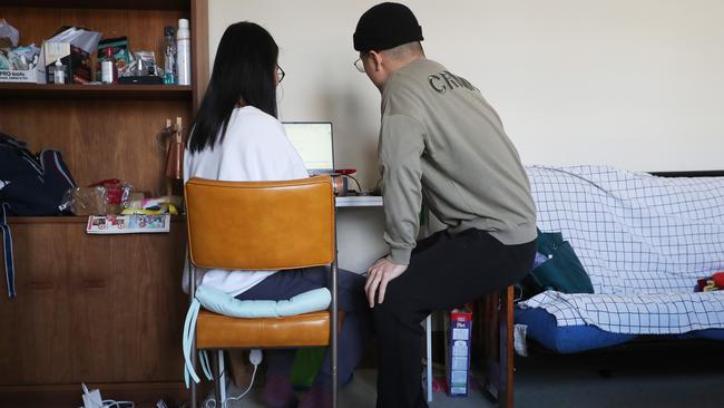 Molly Yang, 28, and her housemate Brian Yan, 26, say international students are reluctant to ask for rent relief for fear it will affect future visa applications. Picture: NIKKI DAVIS-JONES